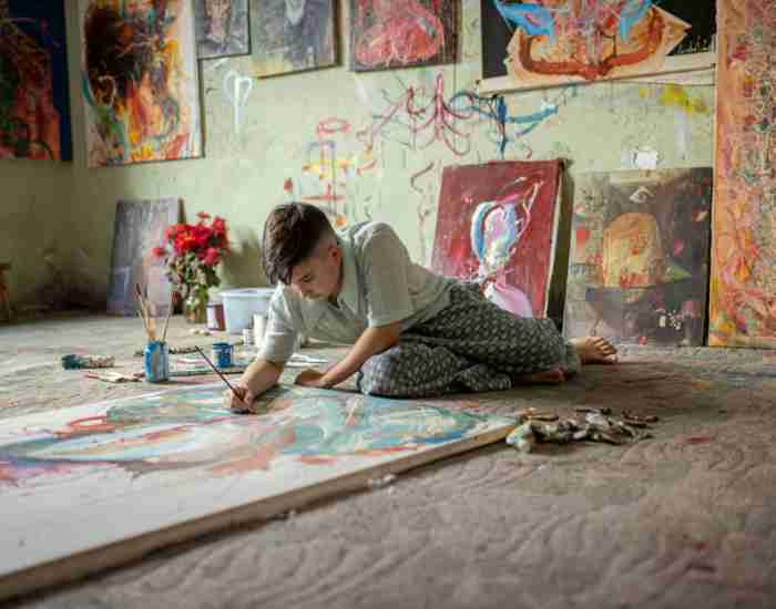 Young artist in the process of creation